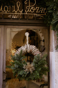 Boutique storefront Christmas wreath for an Urbandale retail shop - Front Porch Collective