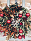 Luxury magnolia Christmas wreath for a Des Moines commercial property - Front Porch Collective