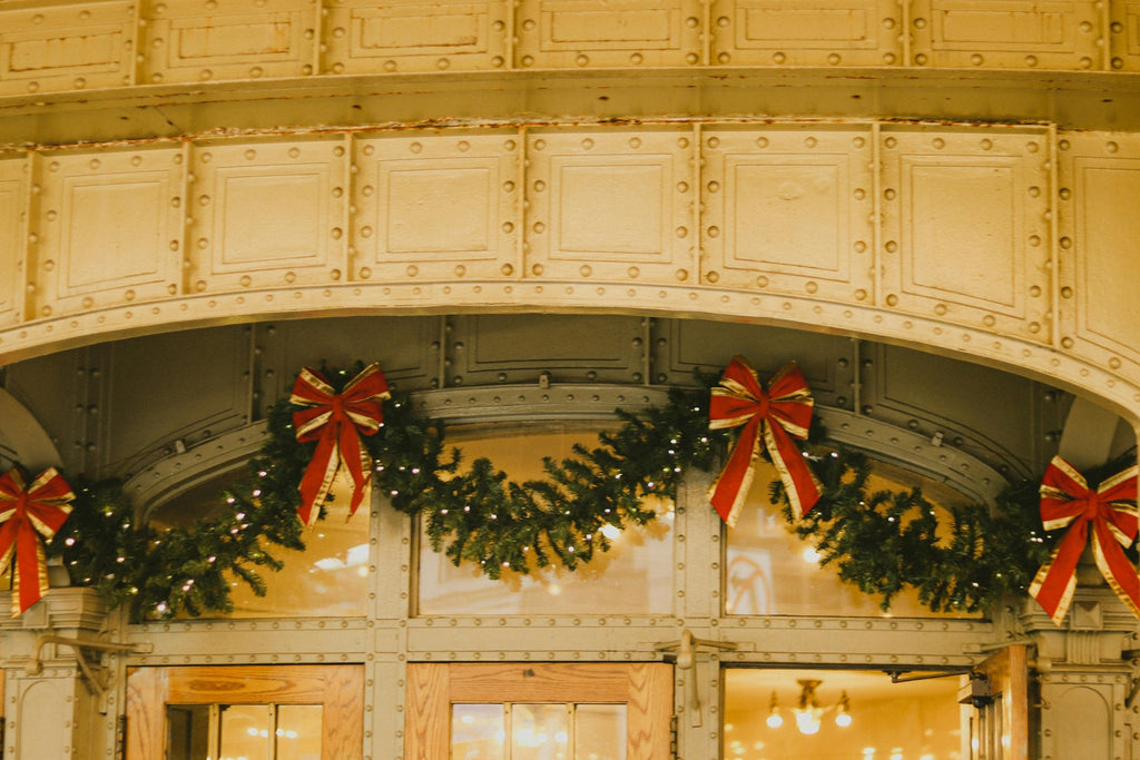Commercial storefront holiday garland for a Waukee retail business - Front Porch Collective